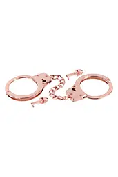 Металеві наручники Fetish Tentation Premium Chick wrist cuffs in rose-gold metal, рожеве золото - мініатюра 3