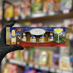 Шоколадні цукерки з лікером Lindt Eierlikör Fläschchen 131г - мініатюра 4