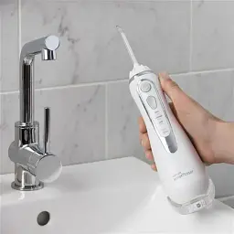 Іригатор Waterpik Cordless Advanced Water Flosser WP-560 White [67740] - мініатюра 7