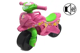 Дитяча каталка мотоцикл музичний толокар 0139/65 "Sport" рожевий DOLONI