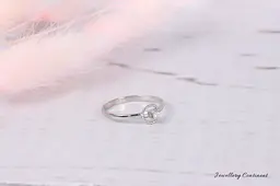 Каблучка з білого золота з діамантом 14.5 K-0303