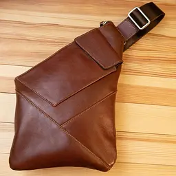 Чоловіча шкіряна сумка-слінг GRANDE PELLE 21х31х1.5 см sum0025493 - мініатюра 6