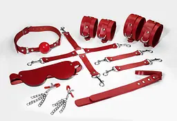 Набір для BDSM Feral Feelings BDSM Kit 7 Red (наручники, поножі, коннектор, маска, паддл, кляп, затискачі)