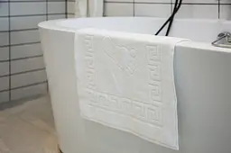 Килимок махровий Ecotton 50х70 см 650 гр./м рушник для ніг білий з тисненням Ніжки для ванної кімнати (24690) - мініатюра 4
