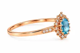 Жіноча каблучка Jewellery Continent з блакитним топазом із червоного золота 14 (К-0873) - мініатюра 3