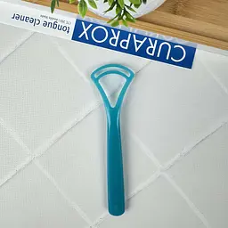 Скребок для язика Curaprox дві дуги (бірюзовий)