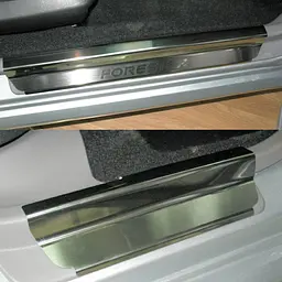 Накладки на пороги для Subaru Forester (SG) 2002-2008 Нержавіюча сталь із загином та Логотипом 4 шт (Premium P-SB01)