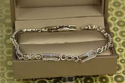 Браслет Xuping Jewelry прямокутні ланки з потрійними кільцями з білими каменями 21 см 5 мм сріблястий