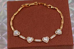 Браслет Xuping Jewelry чотири сердечка 17 см 9 мм золотистий