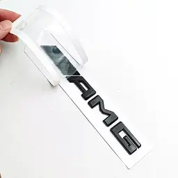 Емблема-напись AMG для Mercedes-Benz чорна глянцева 185х18 мм пластик (на скотчі) - мініатюра 2