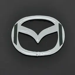 Емблема для Mazda 626 пластикова 85 x 65 мм - мініатюра 2