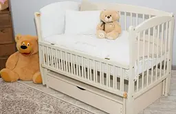 Ліжечко для новонароджених з механізмом заколисування, відкидним бортиком та ящиком "Элит" BabyRoom Слонова кістка