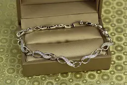 Браслет Xuping Jewelry Вісімки з камінчиками 19 см 5 мм сріблястий