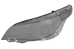 Скло фари ліве BMW 5 E60, E61 07.03-02.07 TYC (20-12926-LA-1)