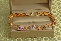 Браслет Xuping Jewelry Вічність з темними різнокольоровими каменями 19 см 8 мм золотистий