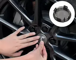 Ковпак колеса Tesla чорний білий 56 мм алюміній 1 шт OEM 600587900A (ковпачок, заглушка диска)