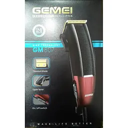 Машинка для стрижки волосся Gemei GM-807 від мережі 4 насадки та ножиці у комплекті - мініатюра 2