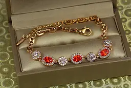 Браслет Xuping Jewelry малинки із червоними каменями з колами 17,5 см 7 мм золотистий