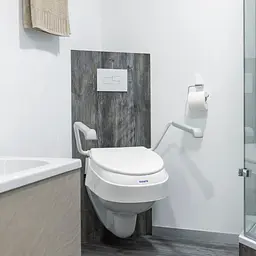 Сидіння для туалету Invacare Aquatec AT900 з підлокітниками (1012810-2694) - мініатюра 4