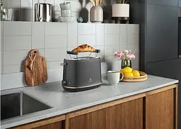 Тостер 980Вт, метал, чорний Electrolux kuh0014921 - мініатюра 4