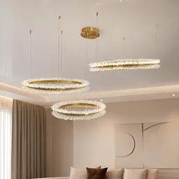 Велика трикільцева LED люстра Artlight 2055/3GD в оздобленні золотий сатин із прозорим декором 85W