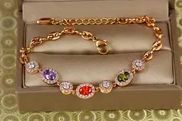 Браслет Xuping Jewelry малинки із різнокольоровими каменями з колами 17,5 см 7 мм золотистий