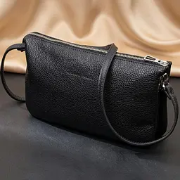Зручний жіночий клатч із натуральної зернистої шкіри Grande Pelle 11697 чорний