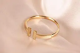 Каблучка Tiffany з жовтого золота 16 K-0031