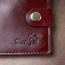 Шкіряне стильне портмоне Shvigel 16442 бордове - мініатюра 10