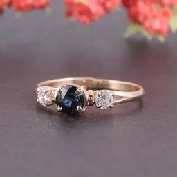 Каблучка з червоного золота з топазом London Blue 20 K-0098