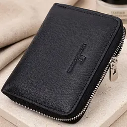 Шкіряний гаманець для жінок на блискавці з тисненим логотипом ST Leather 19489 чорний