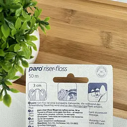 Зубна нитка Paro riser-floss вощена розпушуюча (з м'ятою та фторидом), 50 м - мініатюра 2