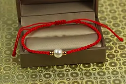 Браслет Xuping Jewelry червона нитка з перлами довжина регулюється золотистий