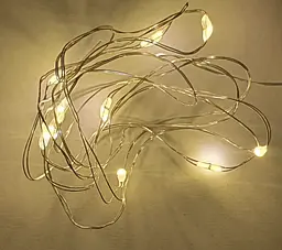 Гірлянда яскрава на двох батарейках AA довжина 120 см 10 LED лампочок із теплим білим світлом 0,6 Вт новорічна - мініатюра 5