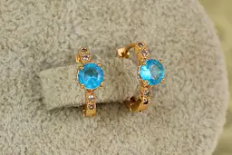Сережки дитячі Xuping Jewelry колечки з блакитним каменем 1,2 см золотисті