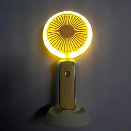 Акумуляторний мінівентилятор Mini Portable Fan 3 Вт, жовтий, вентилятор із підсвіткою і тримачем для телефона - мініатюра 4