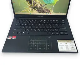 Ноутбук ASUS VivoBook Go 14 E1404F (Ryzen 3 7320U / 4GB DDR5 / SSD 128GB) б/в - мініатюра 2