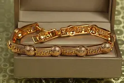 Браслет Xuping Jewelry Версаче без камінчиків 21.5 см 7 мм золотистий