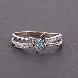 Каблучка з білого золота з топазом 19 K-0287