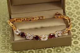 Браслет Xuping Jewelry Зіркопад з червоними каменями 19,5 см золотистий