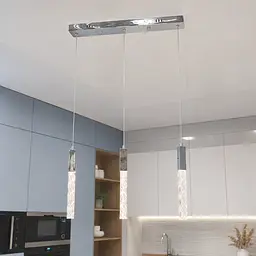 Лінійна срібляста LED люстра на 3 прозорі підвіси Artlight 2350/3SL над столом