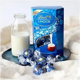 Шоколадні цукерки Lindt Lindor Milk White Limited Edition, 200г - мініатюра 4