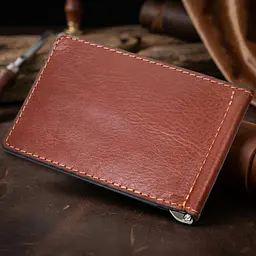 Надійний шкіряний затискач для грошей Grande Pelle 11668 коричневий - мініатюра 2