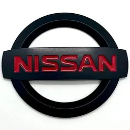 Емблема решітки задня для Nissan матова Чорна 88х75 мм Пластик на скотчі (Завод)