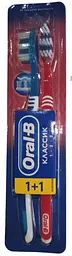 Зубна щітка Oral-B 3-Effect Classic, середня, червоний з синім, 2 шт.