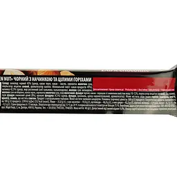 Шоколад Millennium GoldenNut чорний з цільним горіхом 40 г (576840) - мініатюра 3