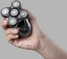 Роторна бритва для голови Remington Ultimate Series RX7 XR1600 чорно-зелений - мініатюра 8