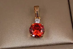 Кулон Xuping Jewelry Капітошка з червоним каменем 7 мм золотистий