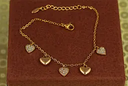 Браслет Xuping Jewelry з підвісками п"ять сердечок 17 см подовжувач 3 см золотистий