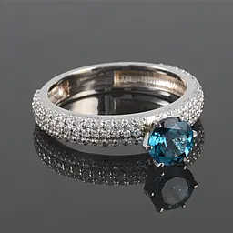 Каблучка з білого золота з топазом London Blue 14.5 K-0124